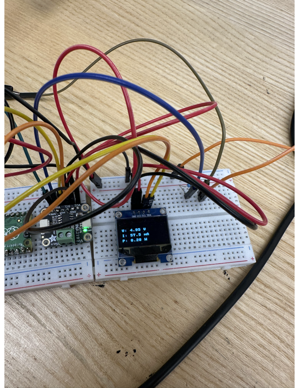 Live voltage, current, and power readout on the OLED